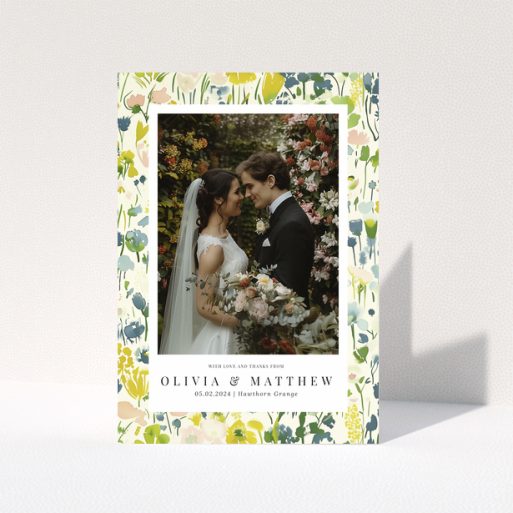 Wedding thank you card with floral design featuring personalised text and one wedding photo