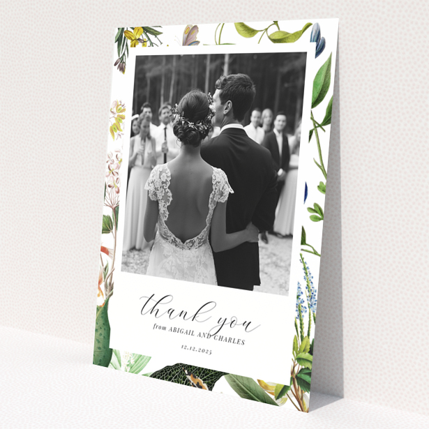 Floral wedding thank you card with couple's back view, one photo