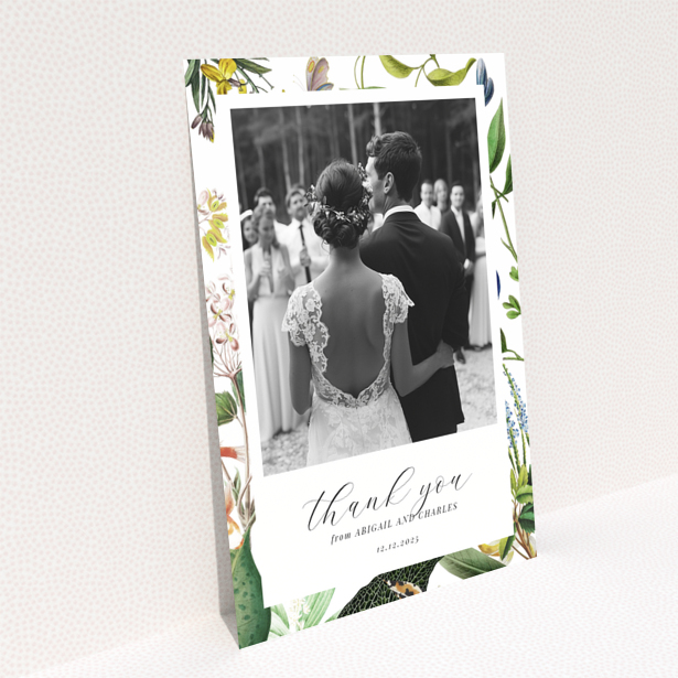 Floral design reverse side of Portrait wedding thank you card with one photo