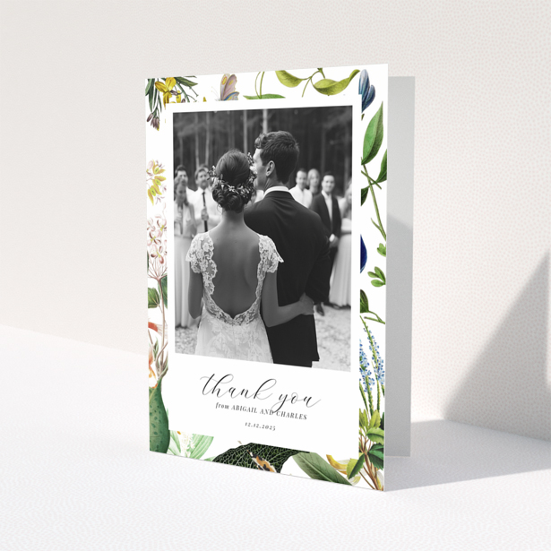 Floral wedding thank you card with couple's back view, one photo