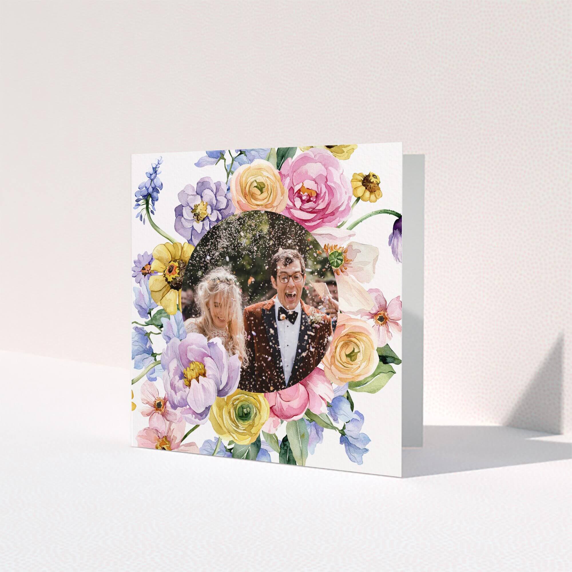 Wedding thank you card design with floral border and one photo of a couple