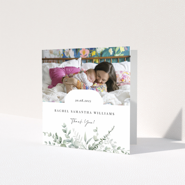 Baby thank you card design featuring one photo with floral decoration