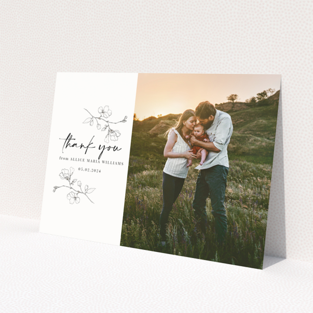 Baby thank you card with floral design and one photo on the right.