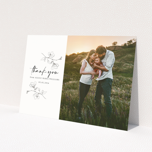 Baby thank you card with floral design and one photo on the right.