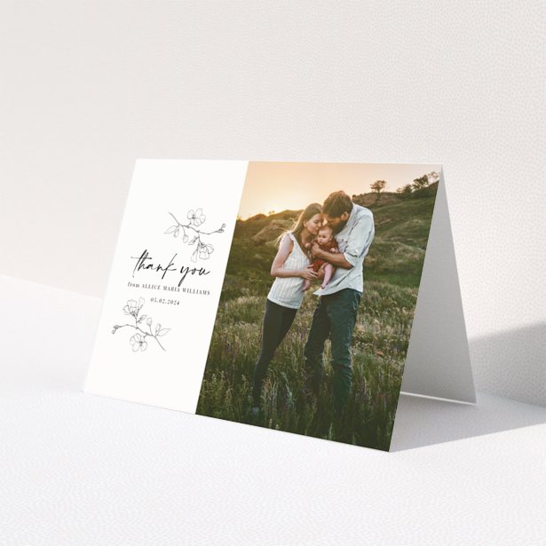 Baby thank you card with floral design and one photo on the right.