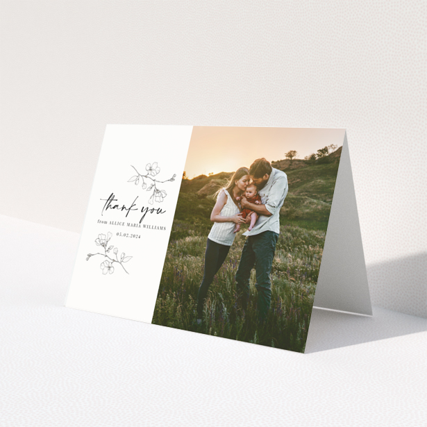 Baby thank you card with floral design and one photo on the right.