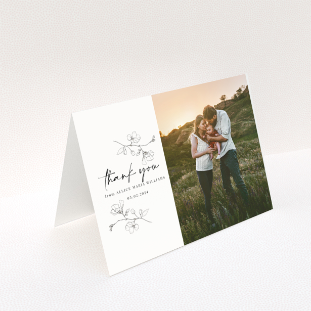 Baby thank you card with floral design and one photo on the right.