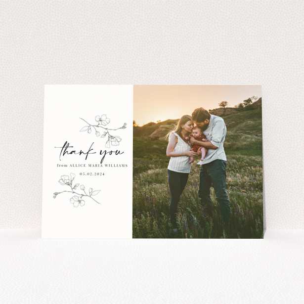 Baby thank you card with floral design and one photo on the right.
