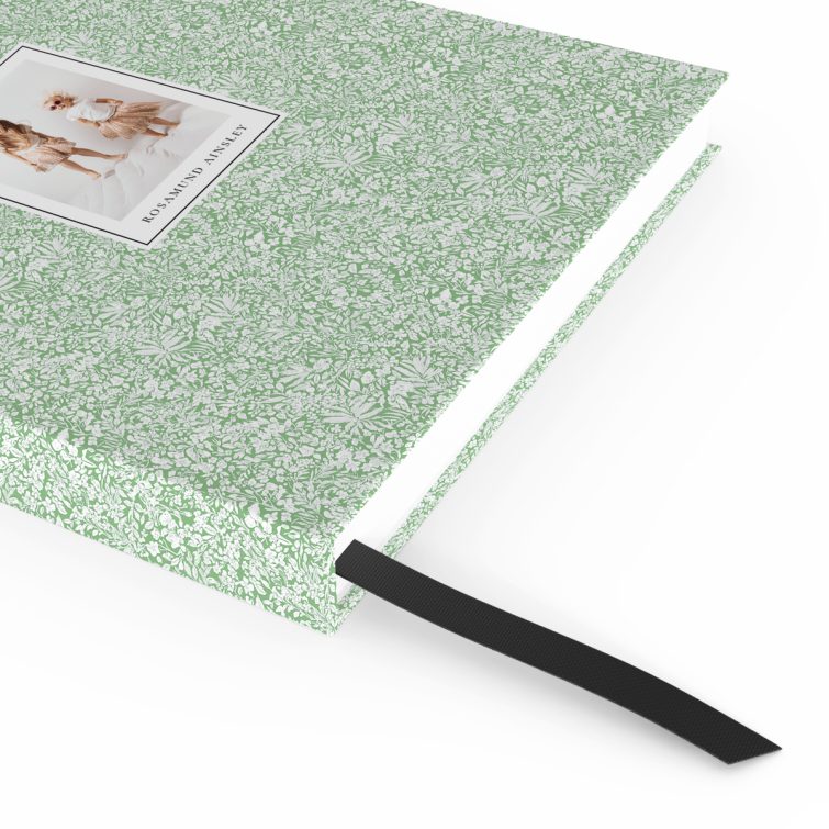 Floral patterned portrait notebook cover design with one photo placeholder for personalised printing.