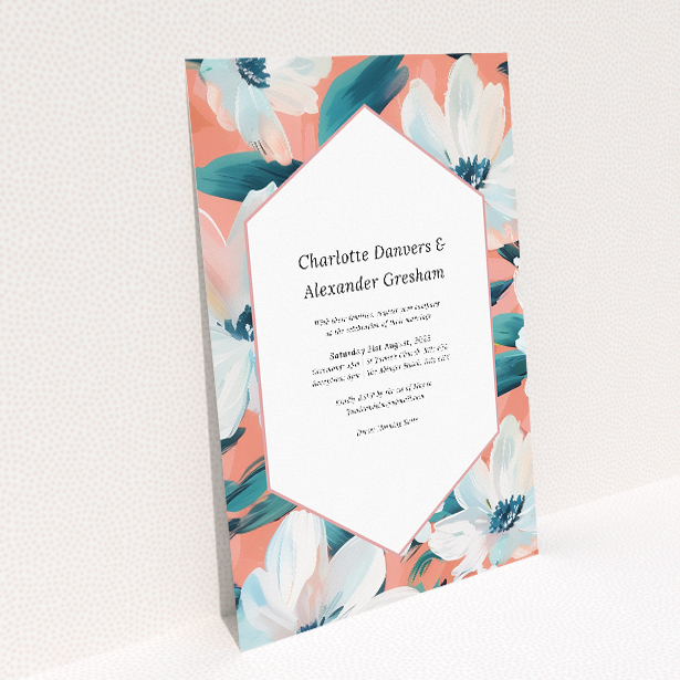 Captivating A5 wedding invitation featuring abstract floral designs in coral, peach, and blue tones against a white background, framed with a hexagonal frame and displaying event details in serif typeface This image shows the front and back sides together