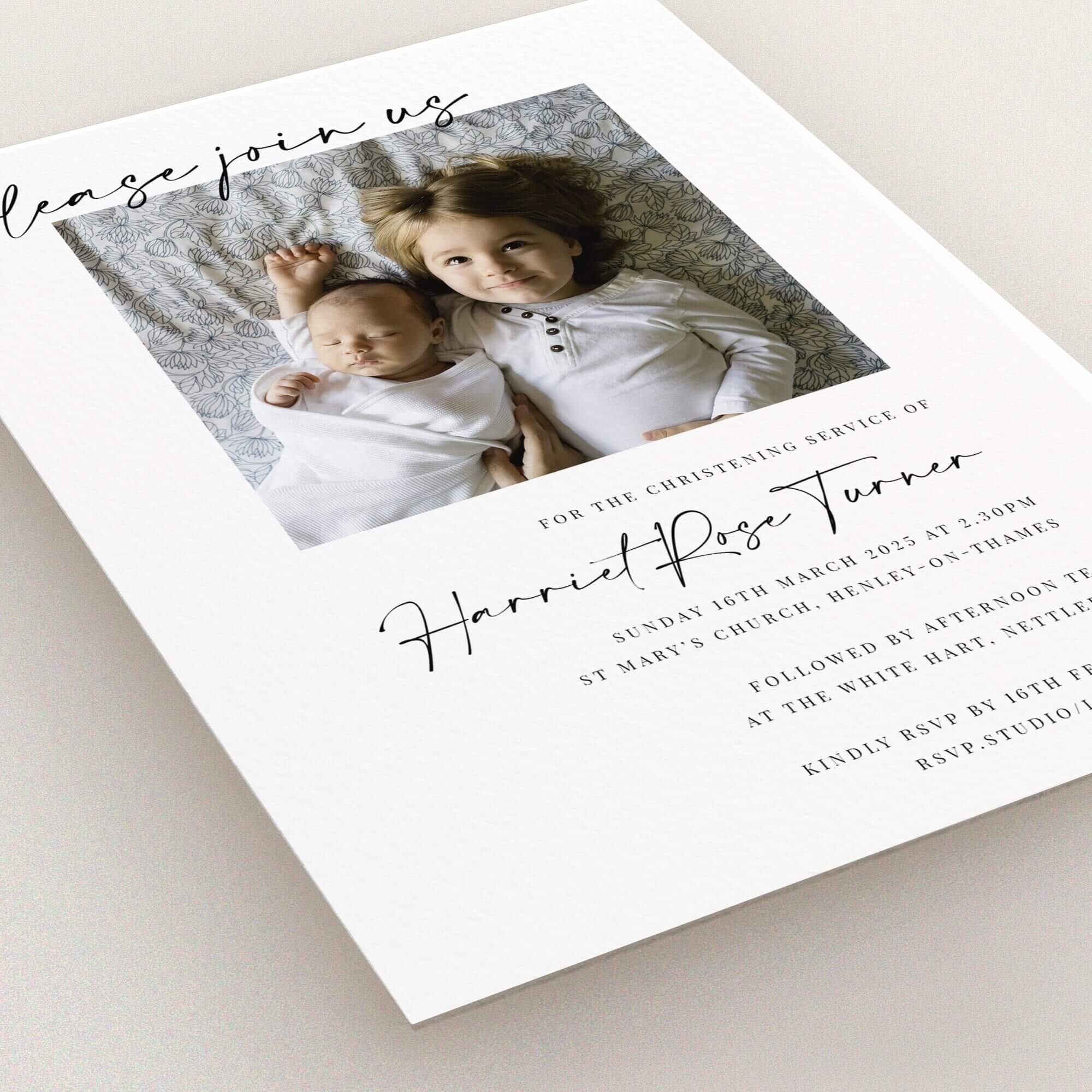Christening invitation with one photo of two children lying down