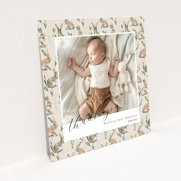 Baby thank you card with floral background and one baby photo.