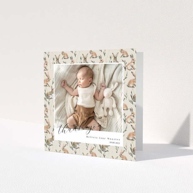 Baby thank you card with floral background and one baby photo.