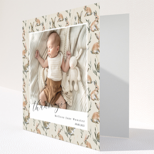 Baby thank you card with floral background and one baby photo.