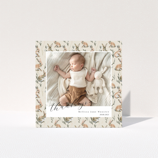 Baby thank you card with floral background and one baby photo.
