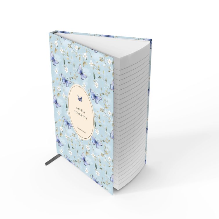 Floral butterfly design daily notebook cover with light blue background and one decorative photo.