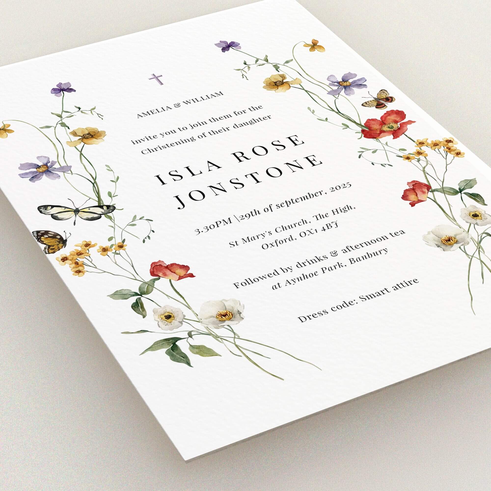 Floral christening invitation design with two butterfly illustrations.