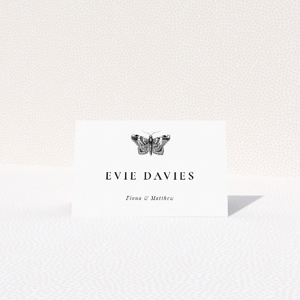 Butterfly Effect place cards table template - reflecting transformation and new beginnings with sophisticated black and white design. This is a view of the front