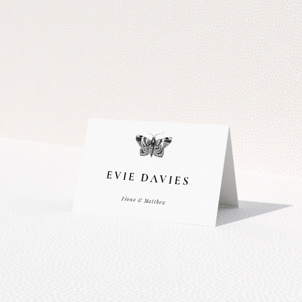 Butterfly Effect place cards table template - reflecting transformation and new beginnings with sophisticated black and white design. This is a third view of the front