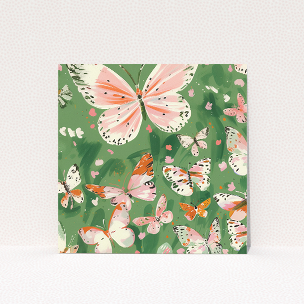 Butterfly Garden Bliss wedding save the date card featuring nature-inspired design with softly-hued butterflies and verdant foliage. This image shows the front and back sides together