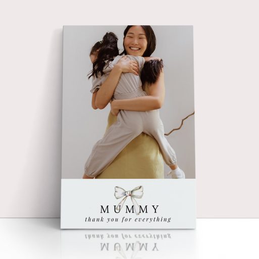 Photo of a canvas print called 'Tied with a bow'. It is 30cm x 20cm in size, in a Portrait orientation. It has space for 1 photos.