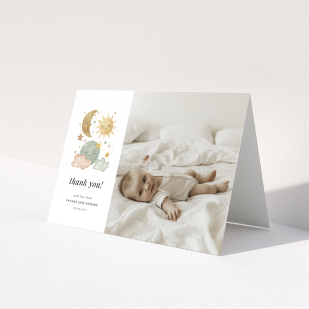 Baby thank you card design featuring celestial illustrations and one baby photo.