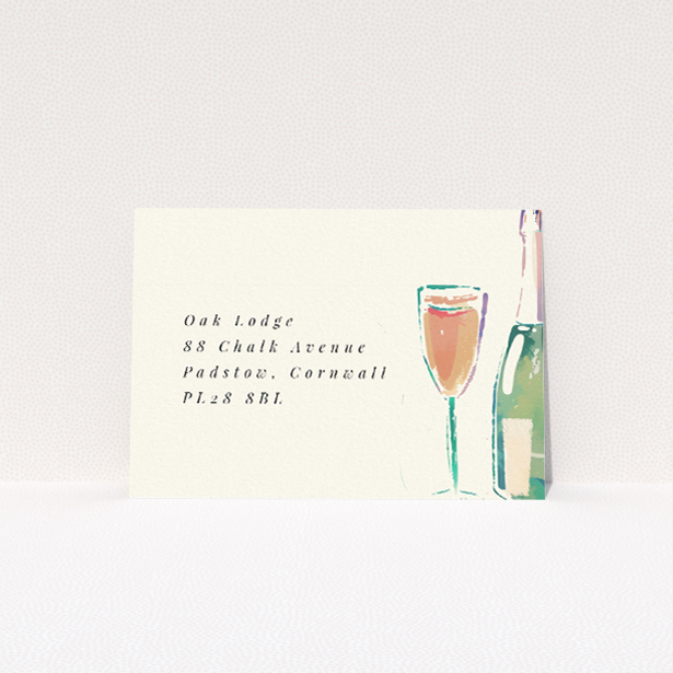 RSVP card from the Champagne Toast suite with whimsical watercolour illustration of champagne flutes and a bottle, set in splashes of green, gold, and peach. This is a view of the back