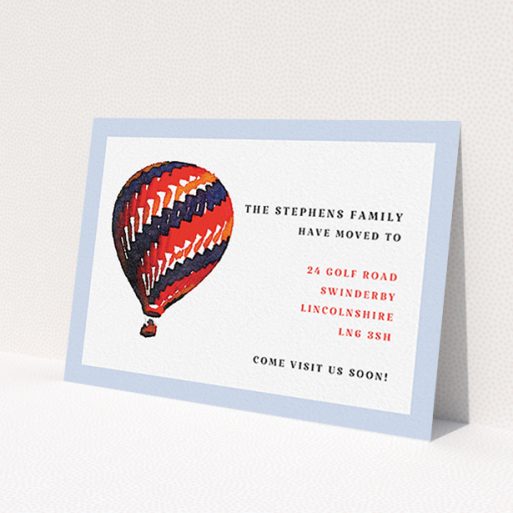 A change of address card design titled 'Balloon Drift'. It is an A6 card in a landscape orientation. 'Balloon Drift' is available as a flat card, with tones of white, light blue and red.