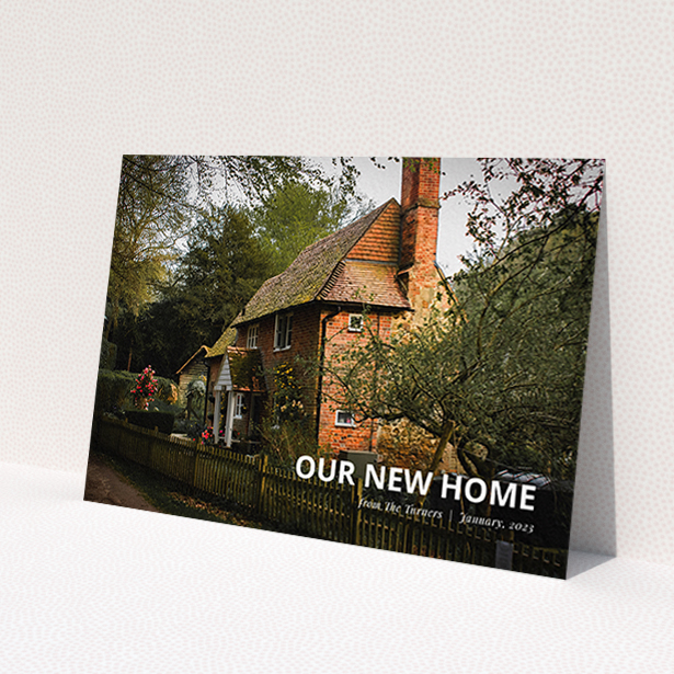 A change of address card named "Our New Home Snap". It is an A6 card in a landscape orientation. It is a photographic change of address card with room for 1 photo. "Our New Home Snap" is available as a flat card, with mainly white colouring.