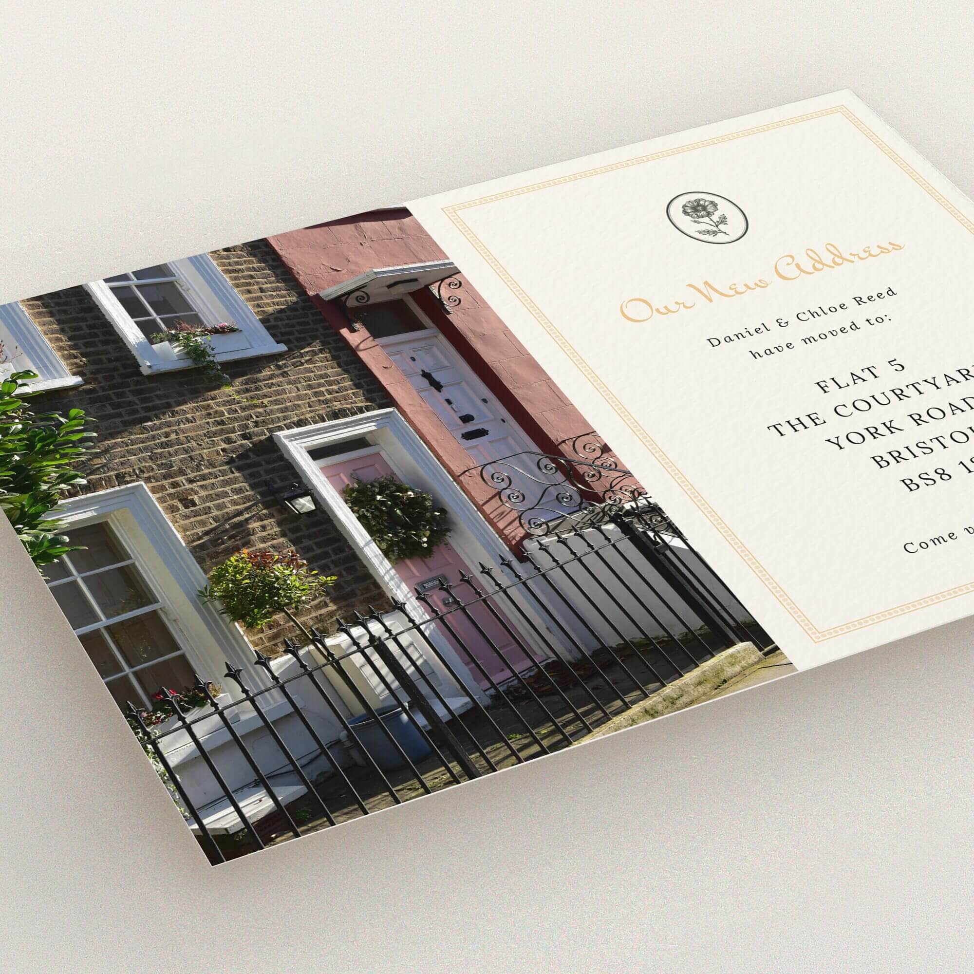 Change of address card design with a photo of a quaint house exterior.