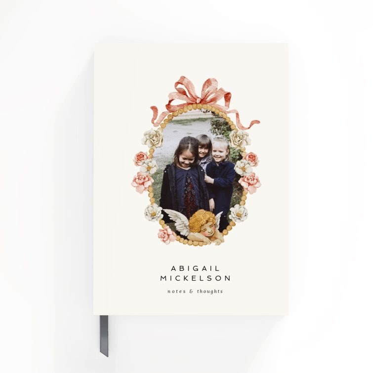 Floral design personalised notebooks with one photo on the cover spread by Utterly Printable.