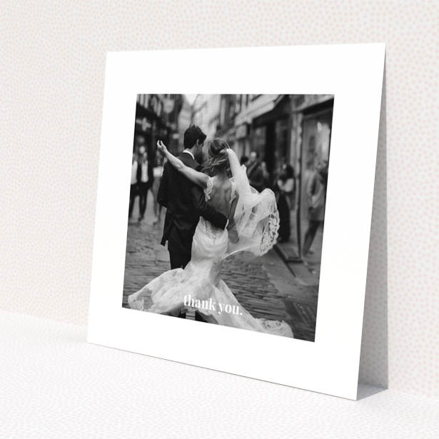 Wedding thank you card with one photo of a newlywed couple dancing.