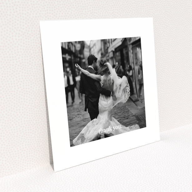 Wedding thank you card with one photo of a newlywed couple dancing.
