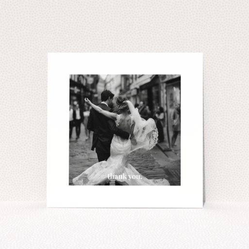 Wedding thank you card with one photo of a newlywed couple dancing.