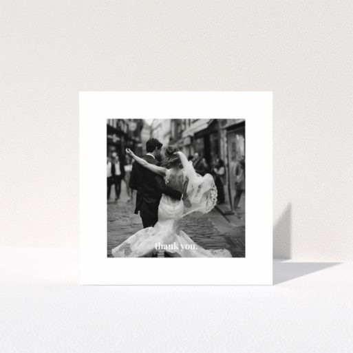 Wedding thank you card with one photo of a newlywed couple dancing.