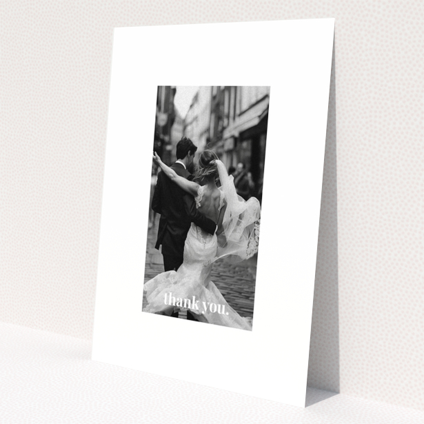 Wedding thank you card with one photo of a newlywed couple dancing.