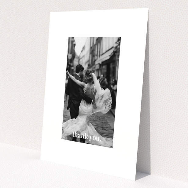 Wedding thank you card with one photo of a newlywed couple dancing.