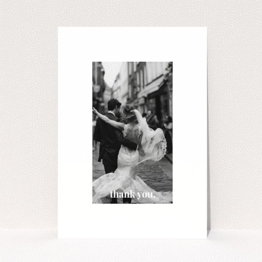 Wedding thank you card with one photo of a newlywed couple dancing.