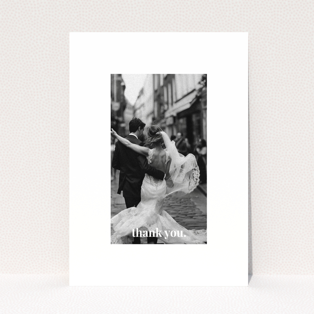Wedding thank you card with one photo of a newlywed couple dancing.