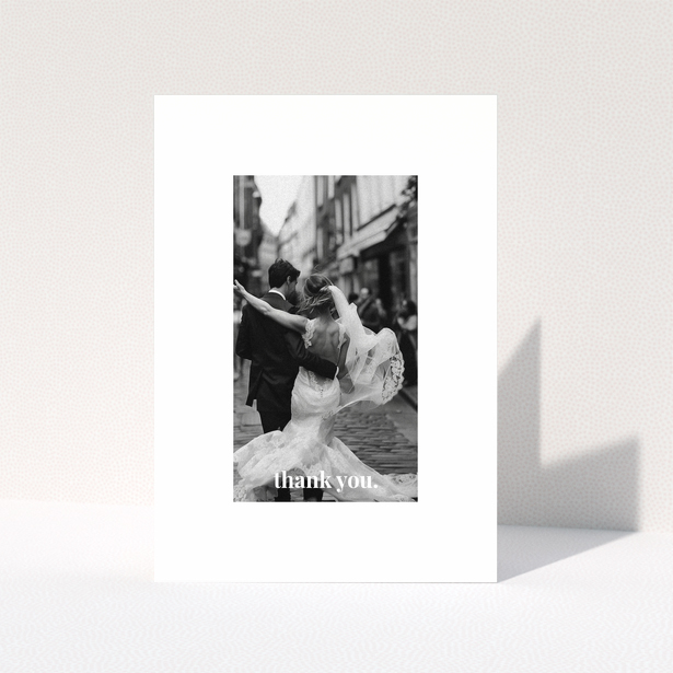 Wedding thank you card with one photo of a newlywed couple dancing.