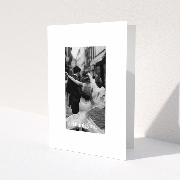 Wedding thank you card with one photo of a newlywed couple dancing.