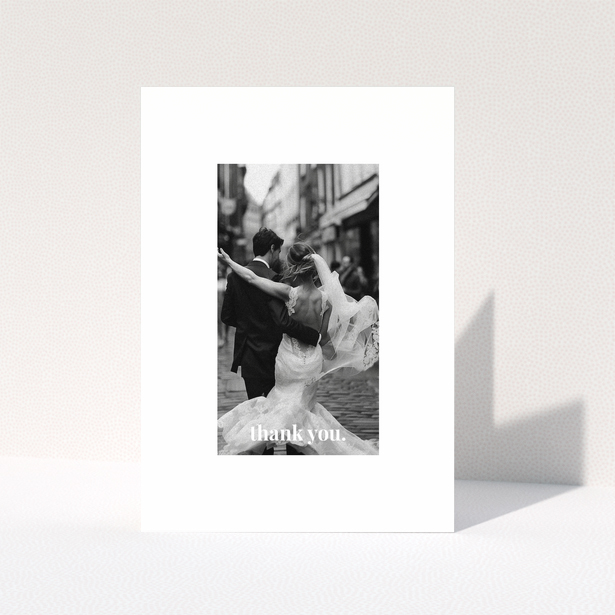 Wedding thank you card with one photo of a newlywed couple dancing.