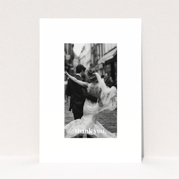 Wedding thank you card with one photo of a newlywed couple dancing.