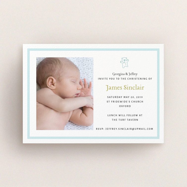 A christening invitation named "Blue Teddy". It is an A6 invite in a landscape orientation. It is a photographic christening invitation with room for 1 photo. "Blue Teddy" is available as a flat invite, with tones of blue and white.