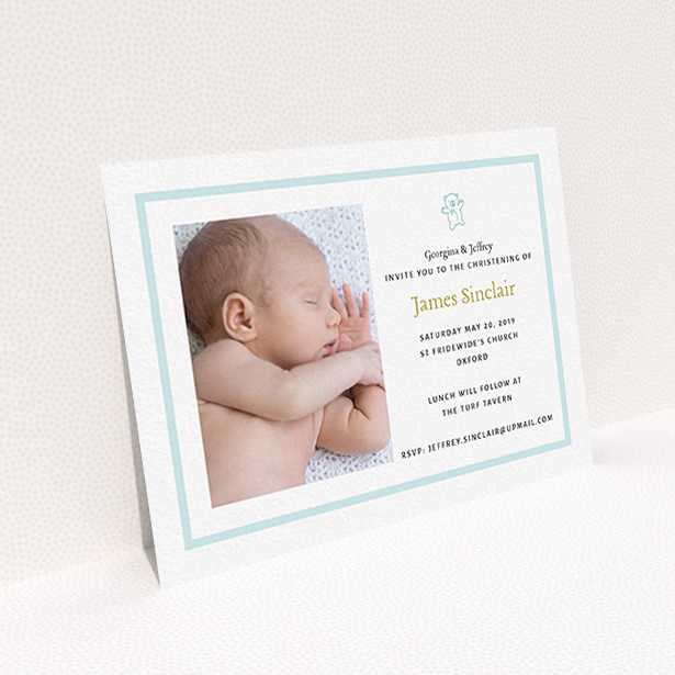 A christening invitation named "Blue Teddy". It is an A6 invite in a landscape orientation. It is a photographic christening invitation with room for 1 photo. "Blue Teddy" is available as a flat invite, with tones of blue and white.