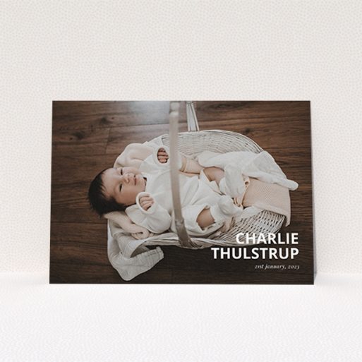 A christening invitation called "Bold Corner Photo". It is an A6 invite in a landscape orientation. It is a photographic christening invitation with room for 1 photo. "Bold Corner Photo" is available as a flat invite, with mainly white colouring.