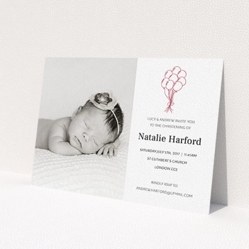 A christening invitation called 'Celebration'. It is an A6 invite in a landscape orientation. It is a photographic christening invitation with room for 1 photo. 'Celebration' is available as a flat invite, with tones of white and red.
