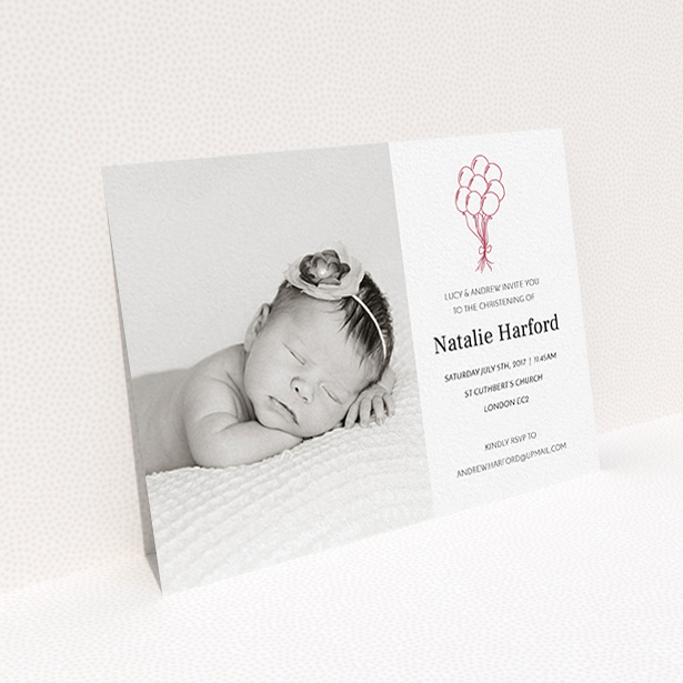 A christening invitation called "Celebration". It is an A6 invite in a landscape orientation. It is a photographic christening invitation with room for 1 photo. "Celebration" is available as a flat invite, with tones of white and red.