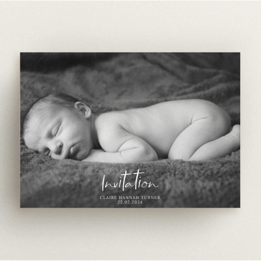 Christening Invitation Design - "Central Script" A christening invitation template titled "Central Script". It is an A5 invite in a landscape orientation. It is a photographic christening invitation with room for 1 photo. "Central Script" is available as a flat invite, with mainly white colouring.
