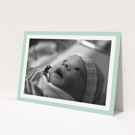 A christening invitation design titled 'Classic Mint Photo Frame'. It is an A5 invite in a landscape orientation. It is a photographic christening invitation with room for 1 photo. 'Classic Mint Photo Frame' is available as a flat invite, with tones of green and white.